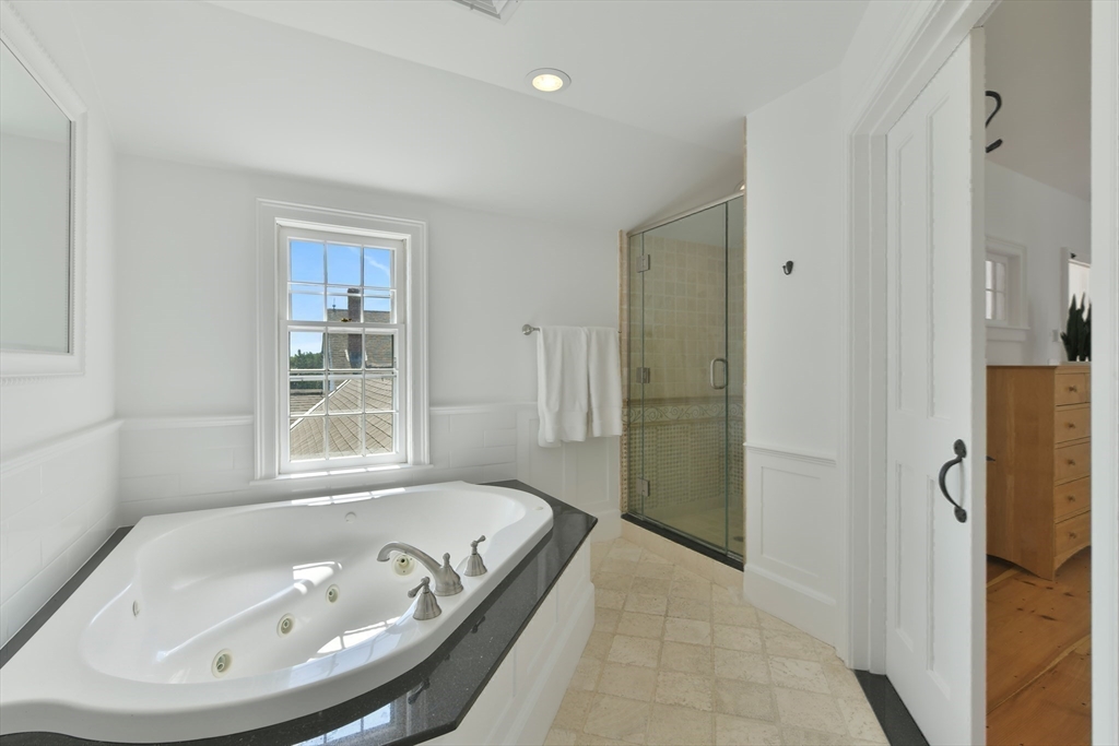 74 Wright Road Ashby, MA 01431 - Photo 15 of 26 a bathroom with a tub and a shower