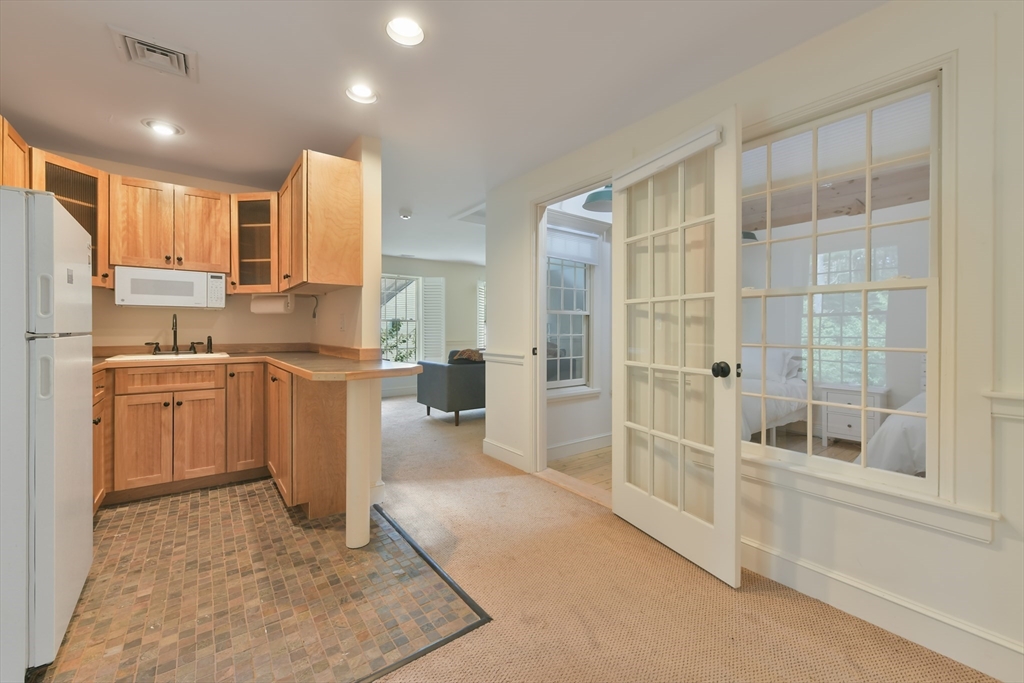 74 Wright Road Ashby, MA 01431 - Photo 17 of 26 a kitchen with a sink a cabinets and window