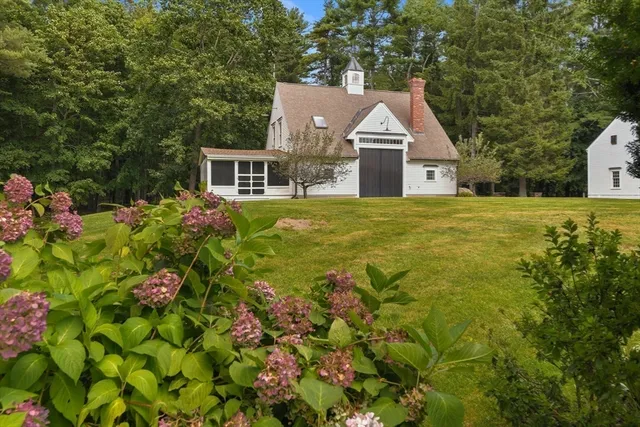 a view of swimming pool with seating area
