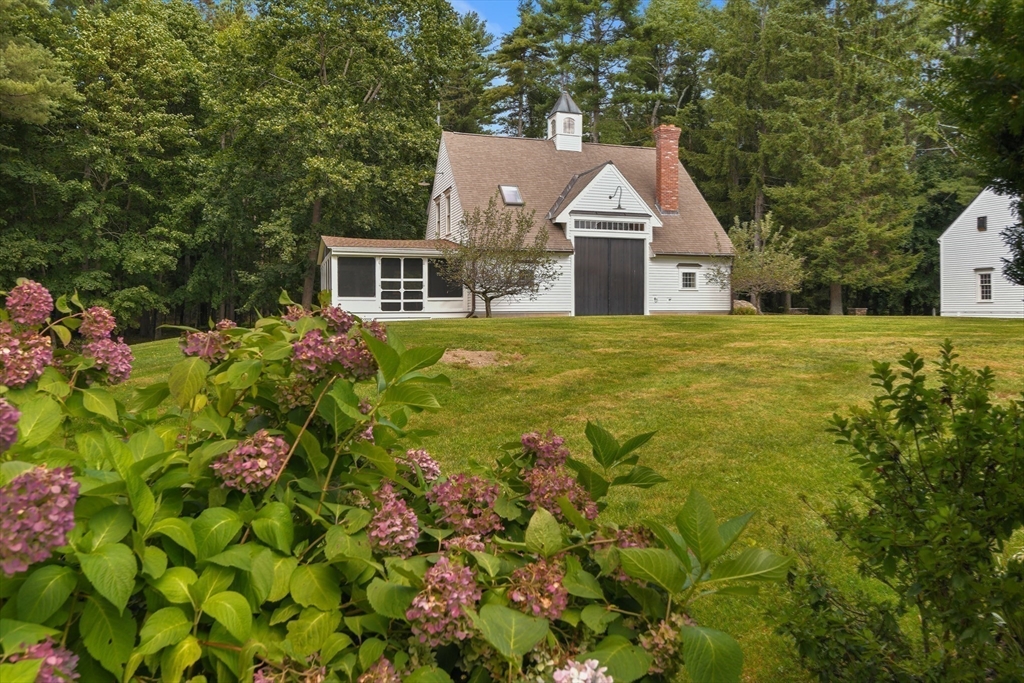 74 Wright Road Ashby, MA 01431 - Photo 18 of 26 a front view of house with yard and green space