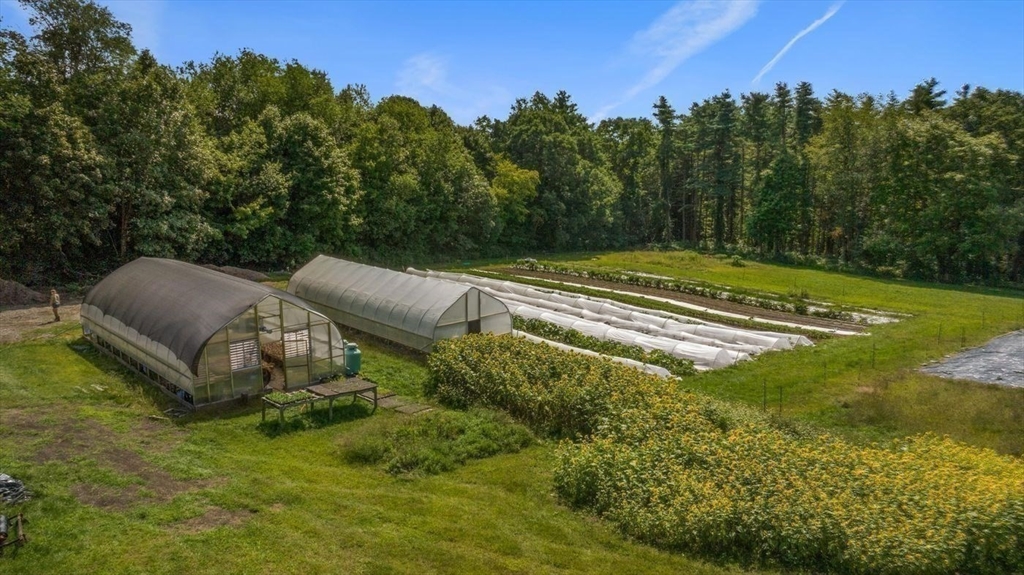 74 Wright Road Ashby, MA 01431 - Photo 21 of 26 a view of a house with a yard