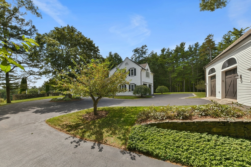 74 Wright Road Ashby, MA 01431 - Photo 23 of 26 a view of a house with a yard