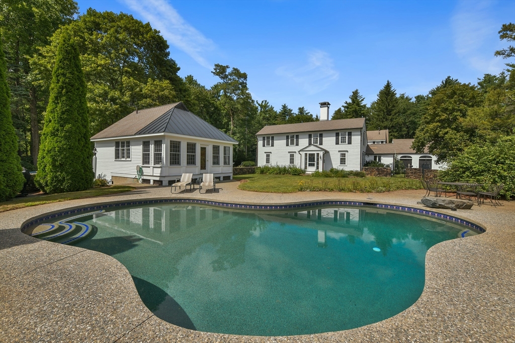 74 Wright Road Ashby, MA 01431 - Photo 24 of 26 a view of a house with a swimming pool