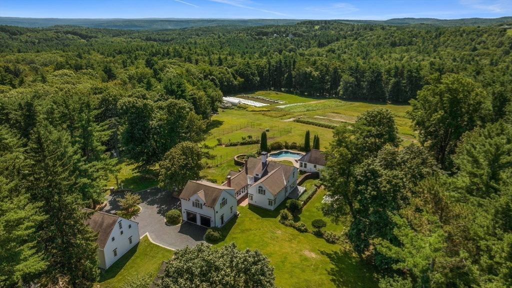 74 Wright Road Ashby, MA 01431 - Photo 25 of 26 an aerial view of a house with mountain view