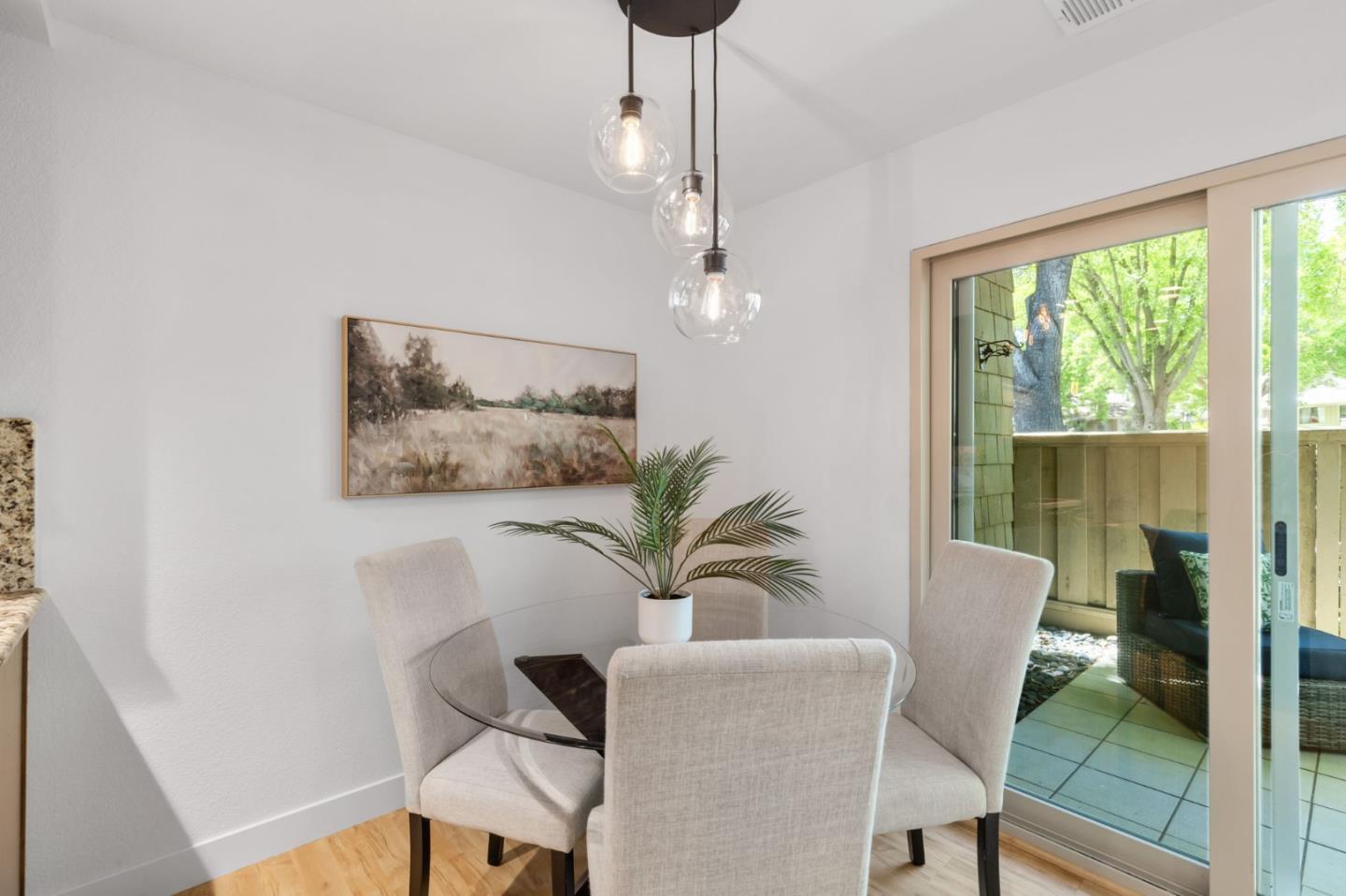 5701 Makati Circle, Unit C San Jose, CA 95123 - Photo 15 of 28 a living room with furniture and a large window