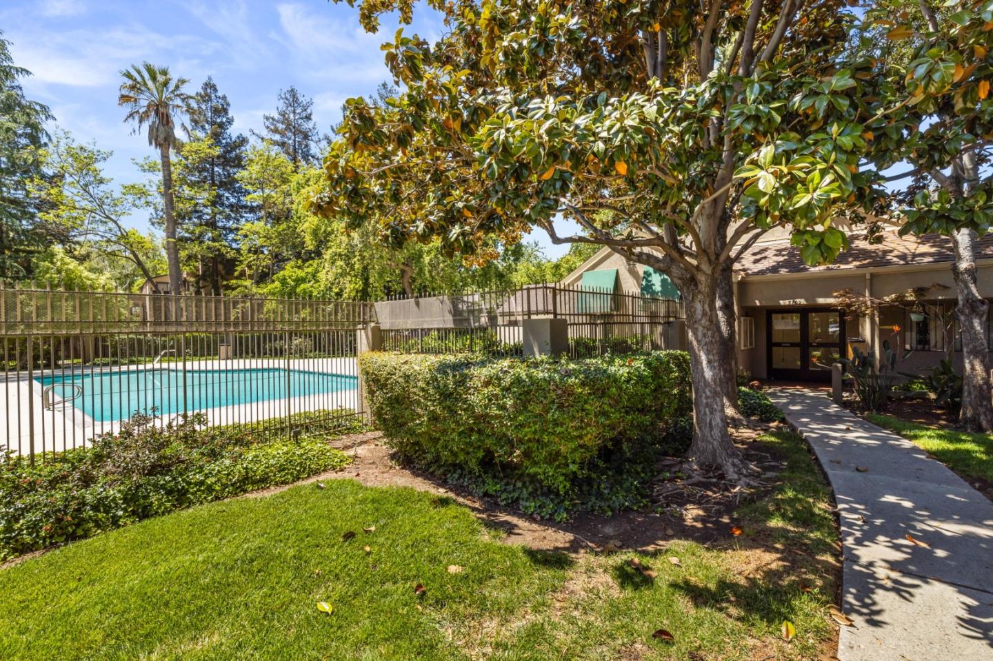 5701 Makati Circle, Unit C San Jose, CA 95123 - Photo 25 of 28 a front view of a house with a yard
