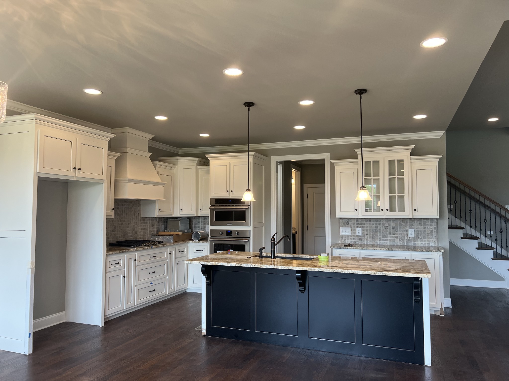 1012 Hideaway Road Columbia, TN 38401 - Photo 5 of 21 a kitchen with stainless steel appliances kitchen island granite countertop a stove a sink and a refrigerator