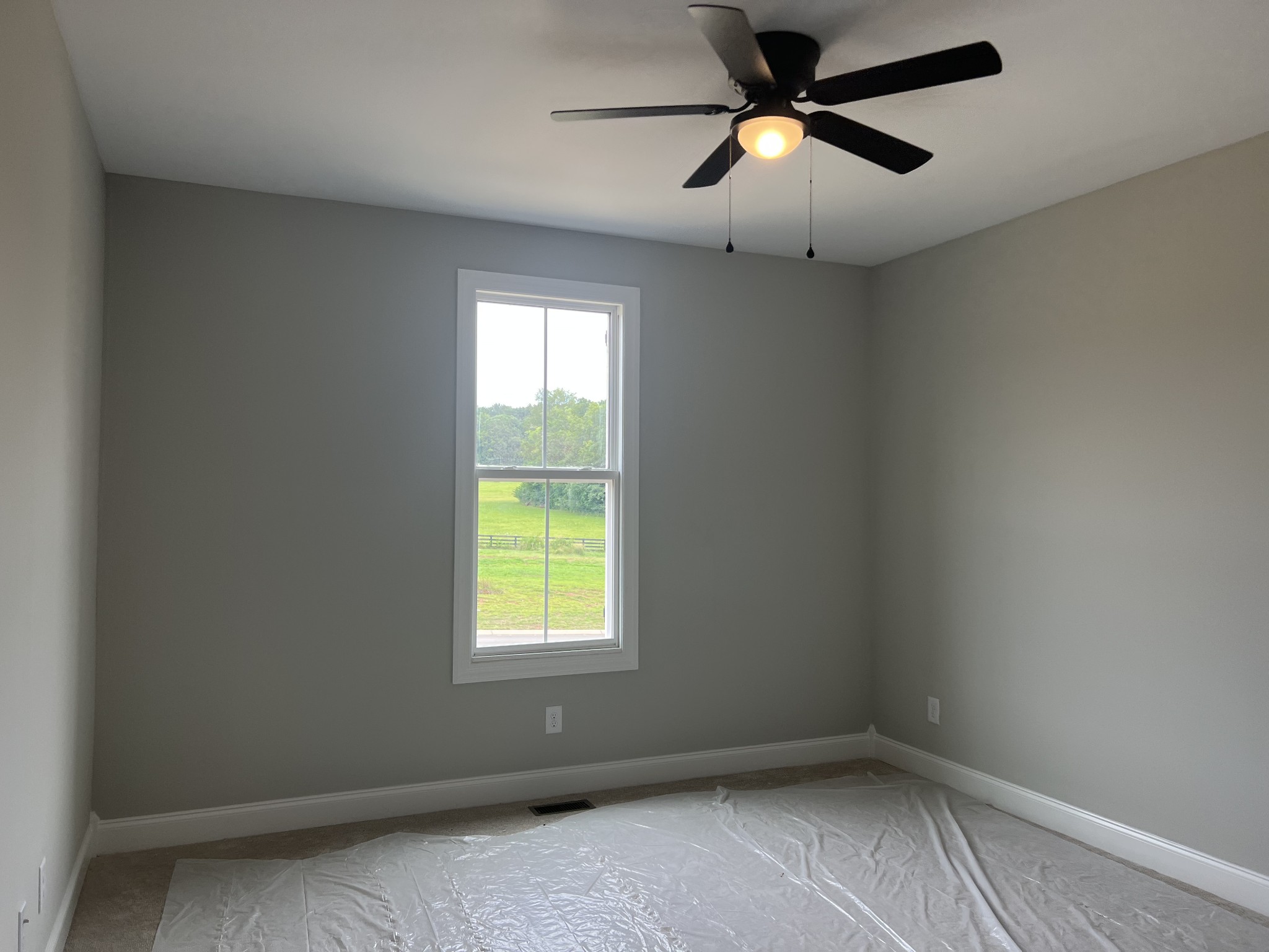 1012 Hideaway Road Columbia, TN 38401 - Photo 10 of 21 an empty room with a window and a fan