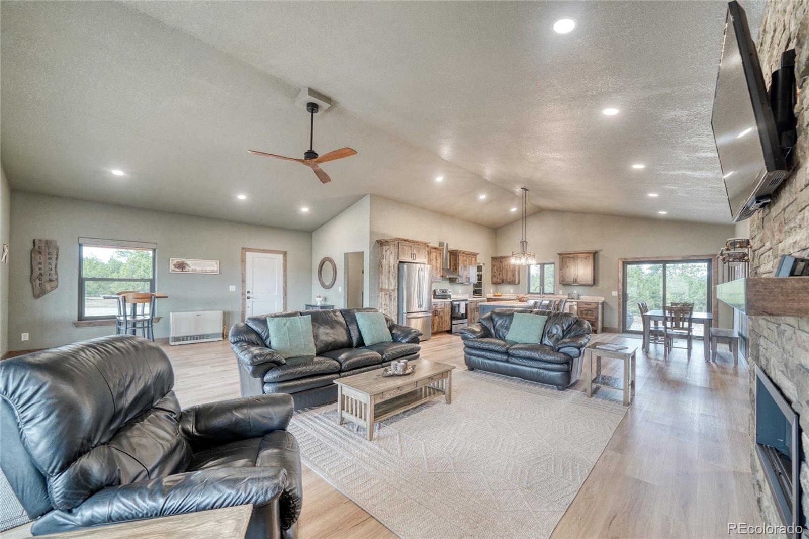946 Hitching Post Road Cotopaxi, CO 81223 - Photo 13 of 50 a living room with furniture and a wooden floor