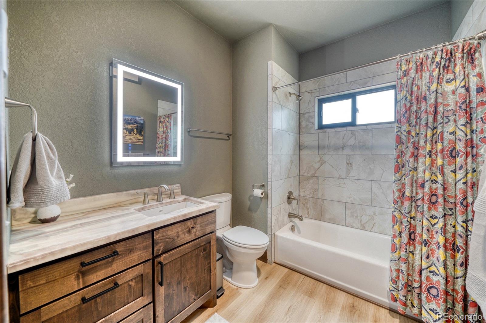 946 Hitching Post Road Cotopaxi, CO 81223 - Photo 36 of 50 a bathroom with a sink a toilet and shower