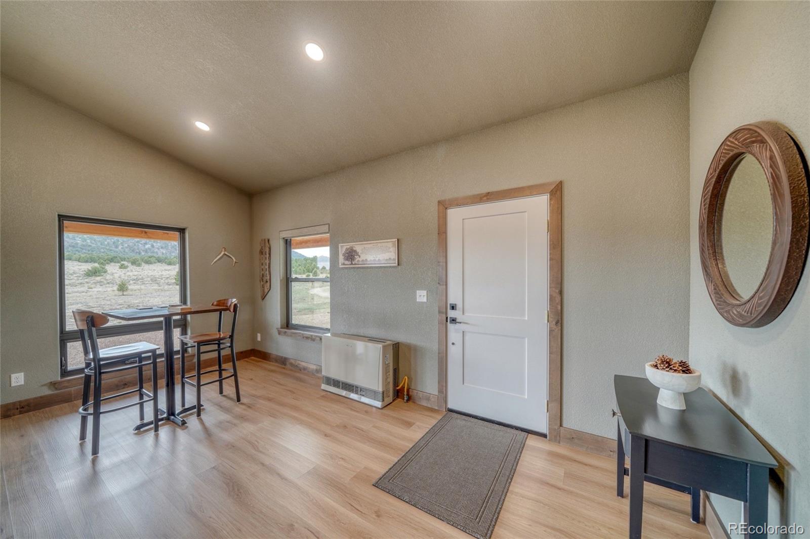 946 Hitching Post Road Cotopaxi, CO 81223 - Photo 4 of 50 a view of a livingroom with furniture and wooden floor