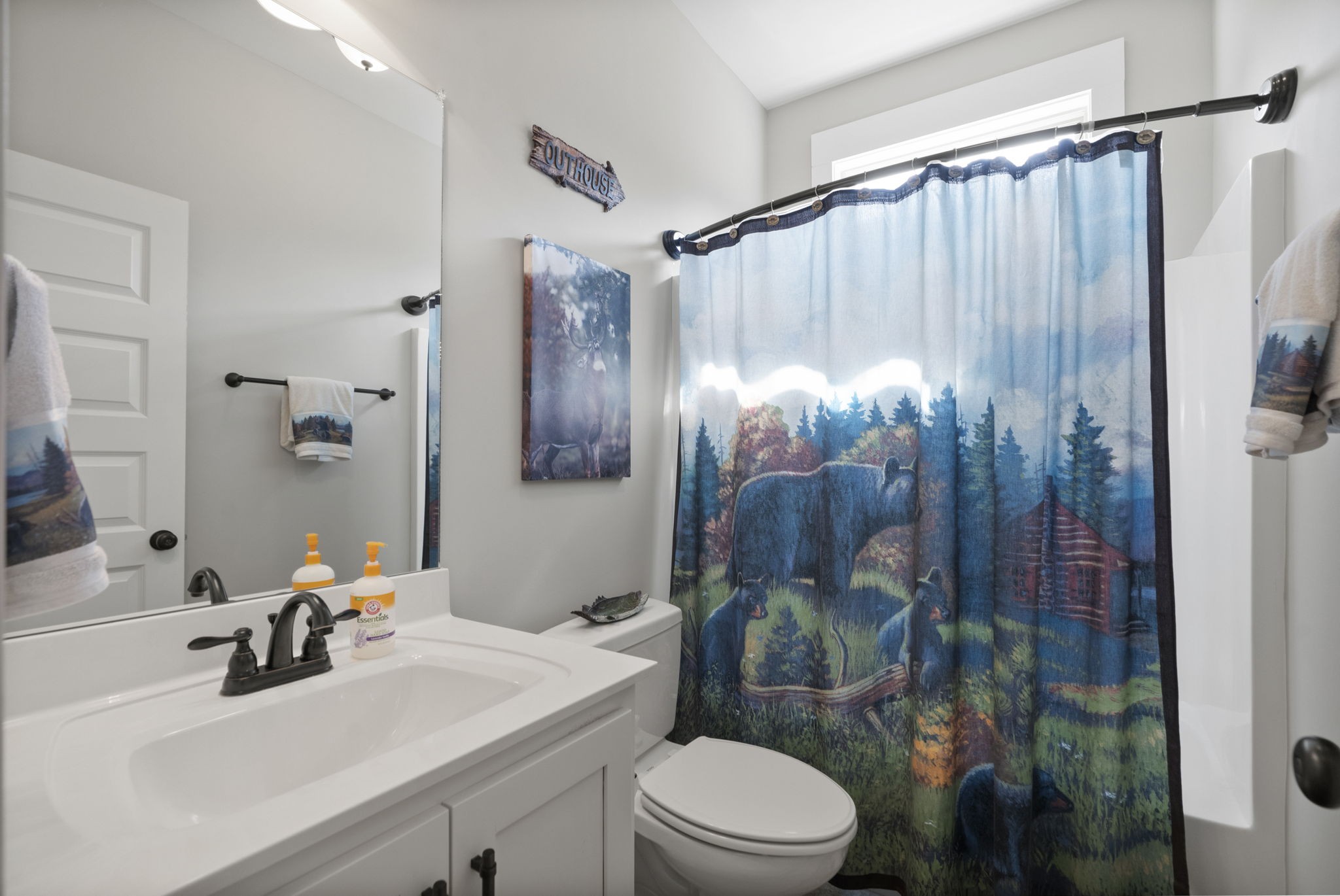 4480 Benson Road Springfield, TN 37172 - Photo 25 of 61 a bathroom with a sink a toilet and shower