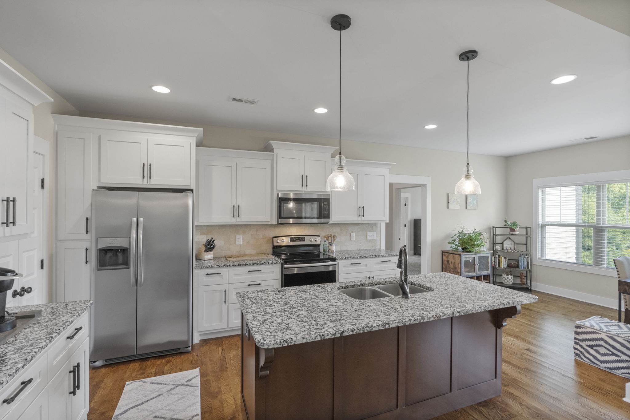 4480 Benson Road Springfield, TN 37172 - Photo 31 of 61 a kitchen with stainless steel appliances granite countertop a sink refrigerator and cabinets