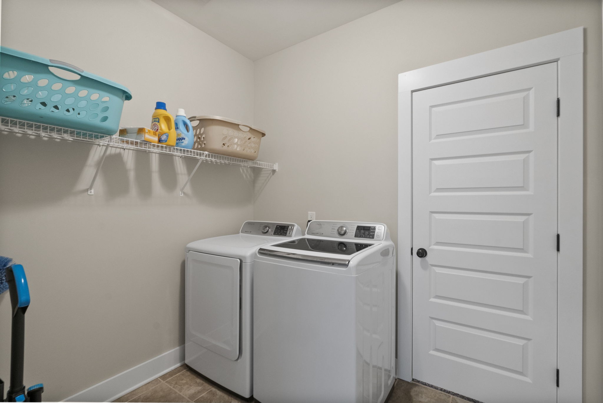 4480 Benson Road Springfield, TN 37172 - Photo 38 of 61 a view of storage and utility room with washer and dryer