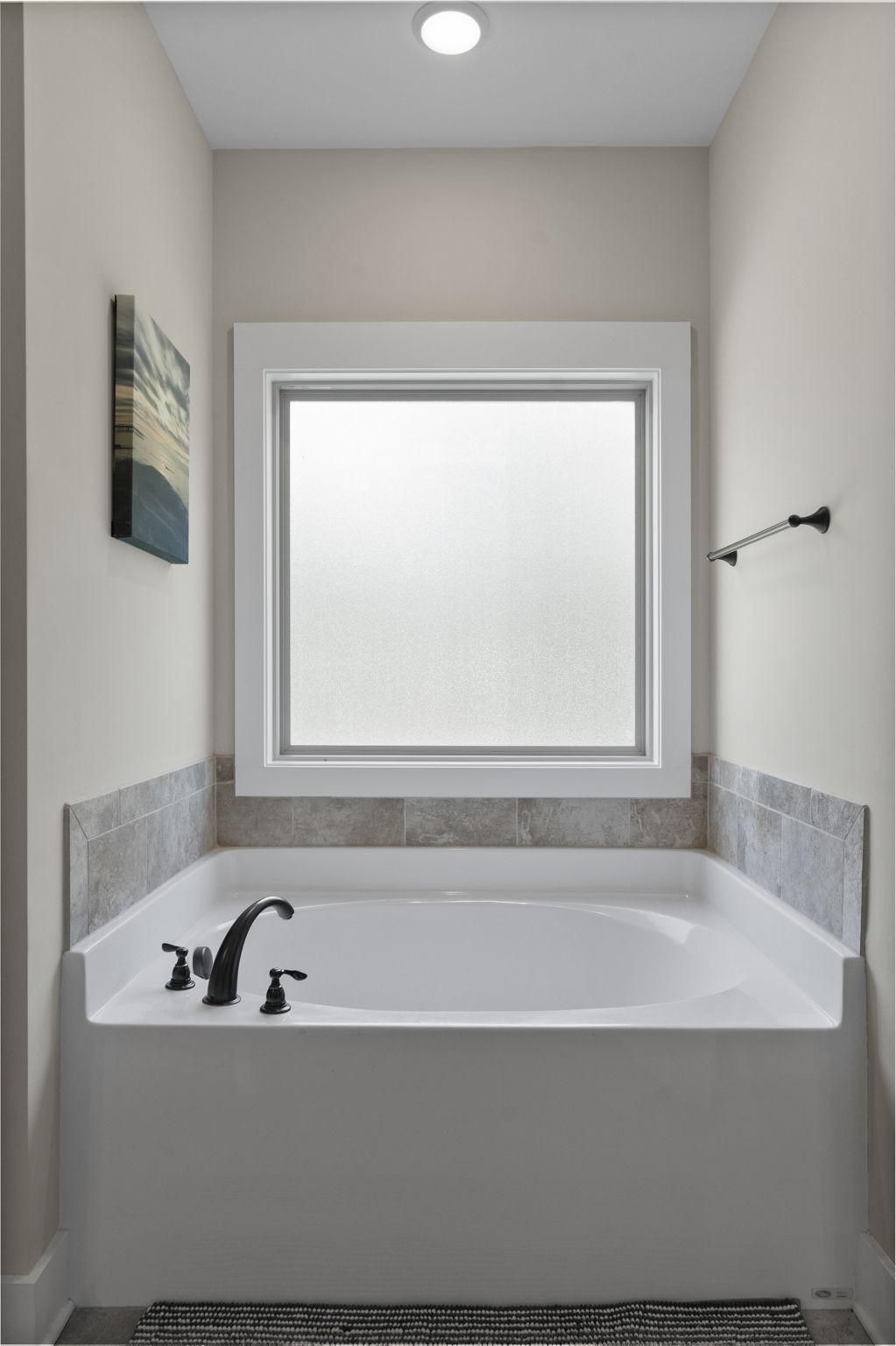 4480 Benson Road Springfield, TN 37172 - Photo 44 of 61 a bathroom with a bathtub and a window