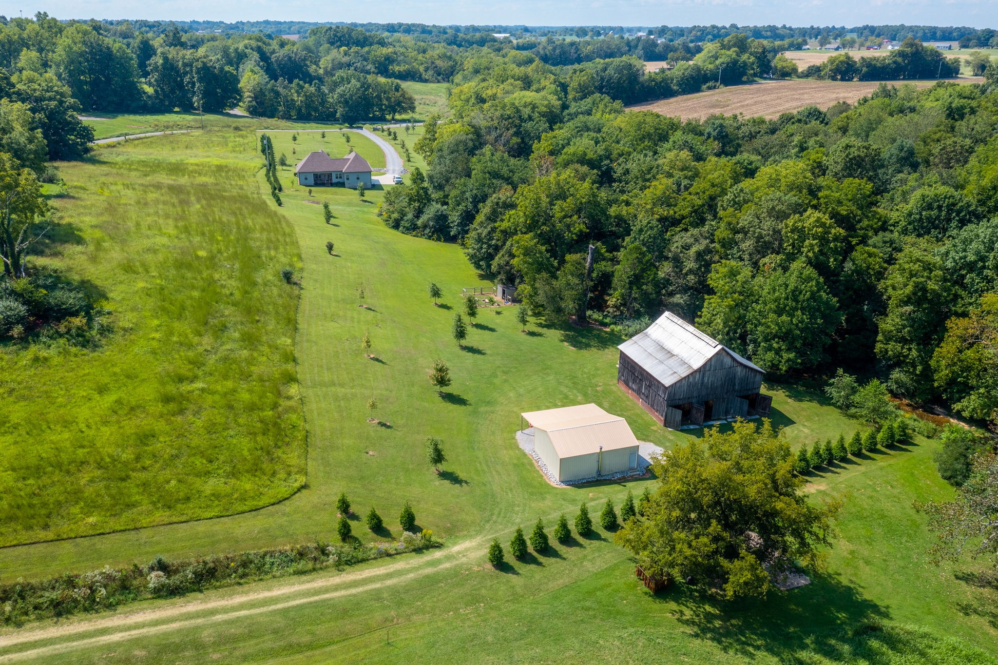 4480 Benson Road Springfield, TN 37172 - Photo 60 of 61 an aerial view of residential house with outdoor space and trees all around