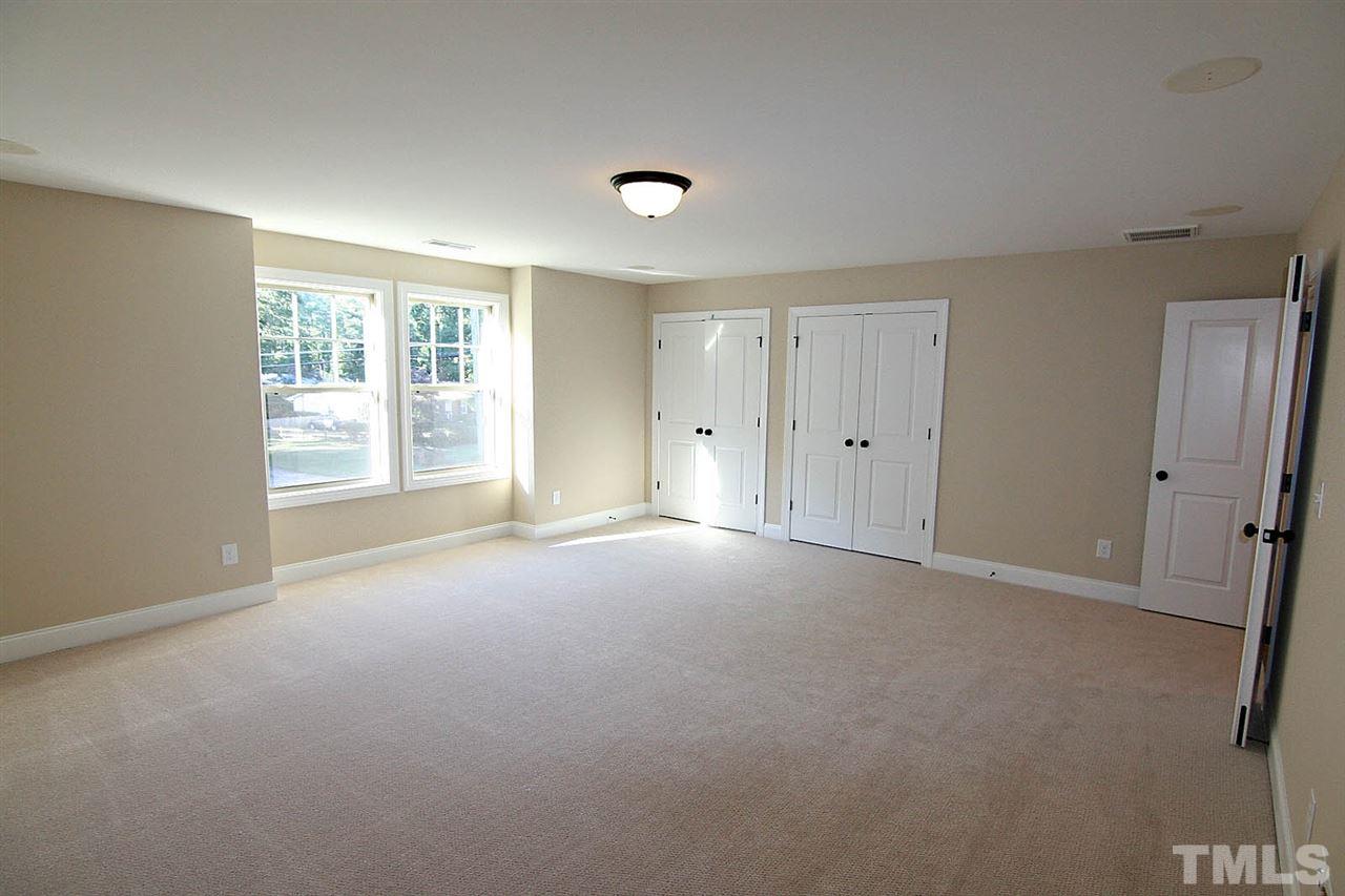 6608 Electra Drive Raleigh, NC 27607 - Photo 22 of 25 a view of empty room with windows