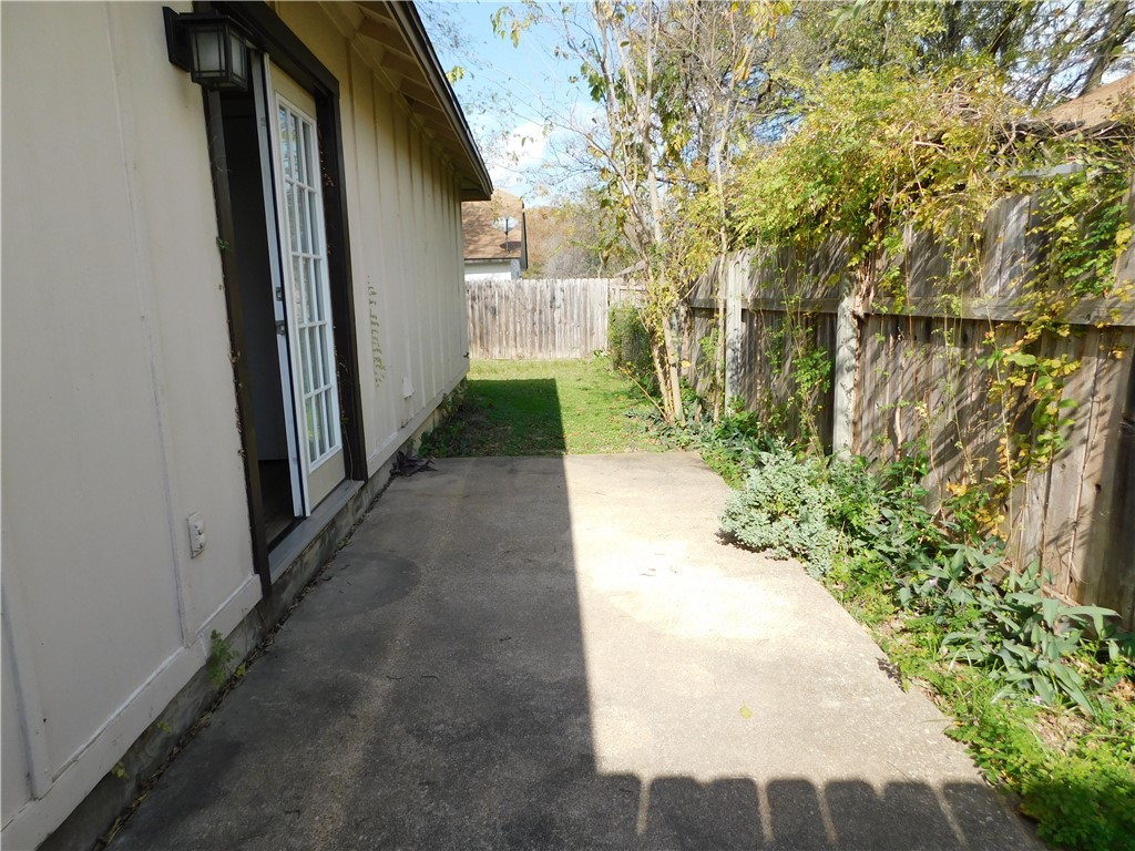 1900 Prairie Knoll Court, Unit A Austin, TX 78758 - Photo 16 of 18 a view of a pathway both side of a house