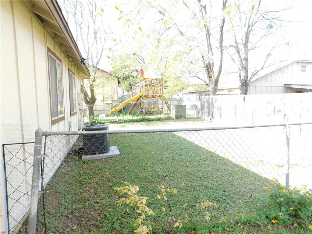 1900 Prairie Knoll Court, Unit A Austin, TX 78758 - Photo 18 of 18 a view of yard with large trees