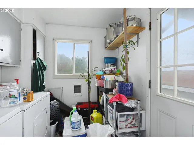 a play room with furniture and a window