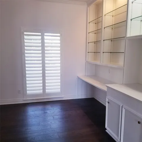 a view of room with window and stairs