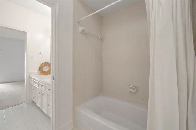 a view of a brick house with a yard