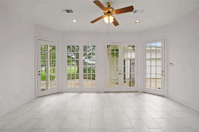 a living room with fireplace furniture and a flat screen tv