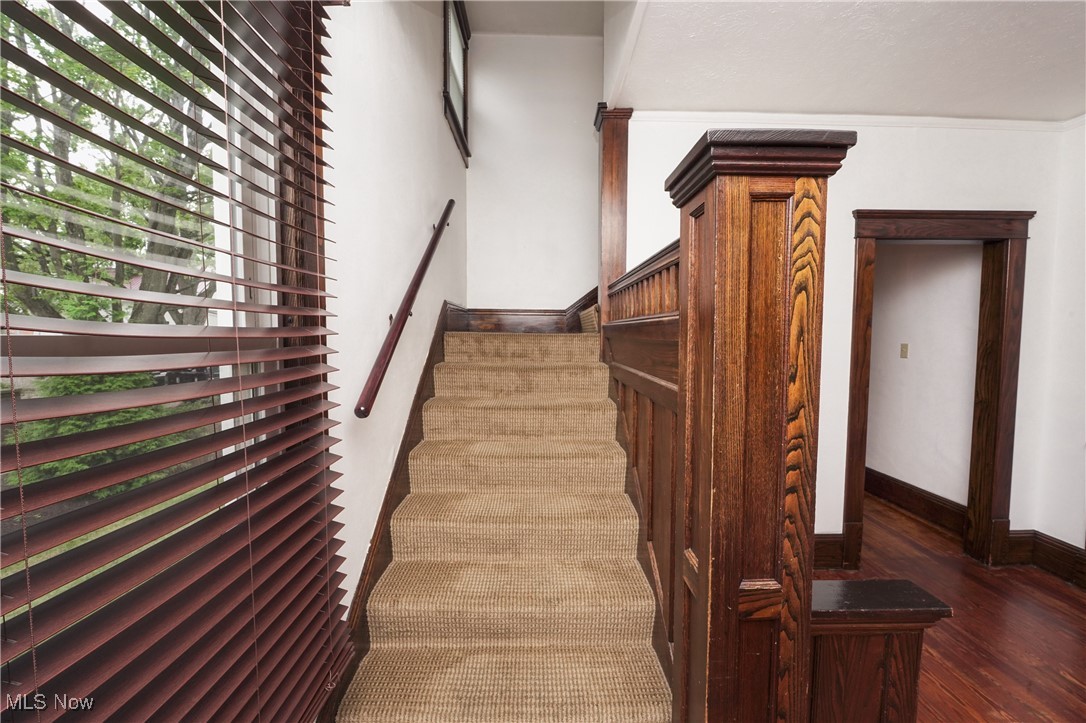 3542 Copley Road Akron, OH 44321 - Photo 24 of 47 Stairs featuring hardwood / wood-style flooring