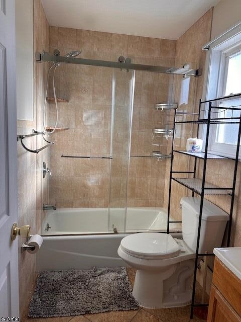 31 Morrell Street, Unit 2B Elizabeth, NJ 07201 - Photo 16 of 23 a bathroom with a toilet and a shower