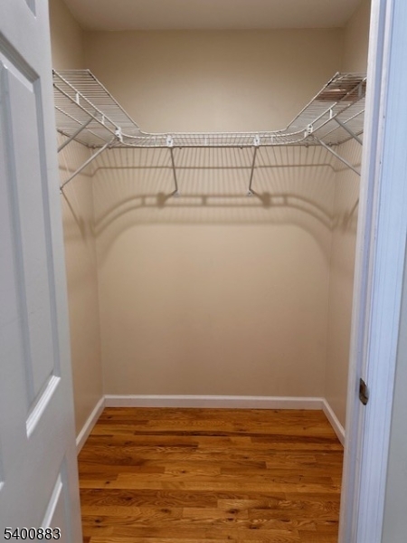 31 Morrell Street, Unit 2B Elizabeth, NJ 07201 - Photo 18 of 23 a view of a room with racks on the wall