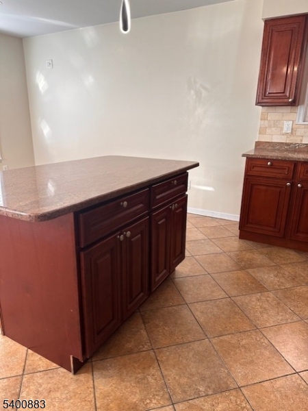 31 Morrell Street, Unit 2B Elizabeth, NJ 07201 - Photo 9 of 23 a kitchen with a sink and cabinets