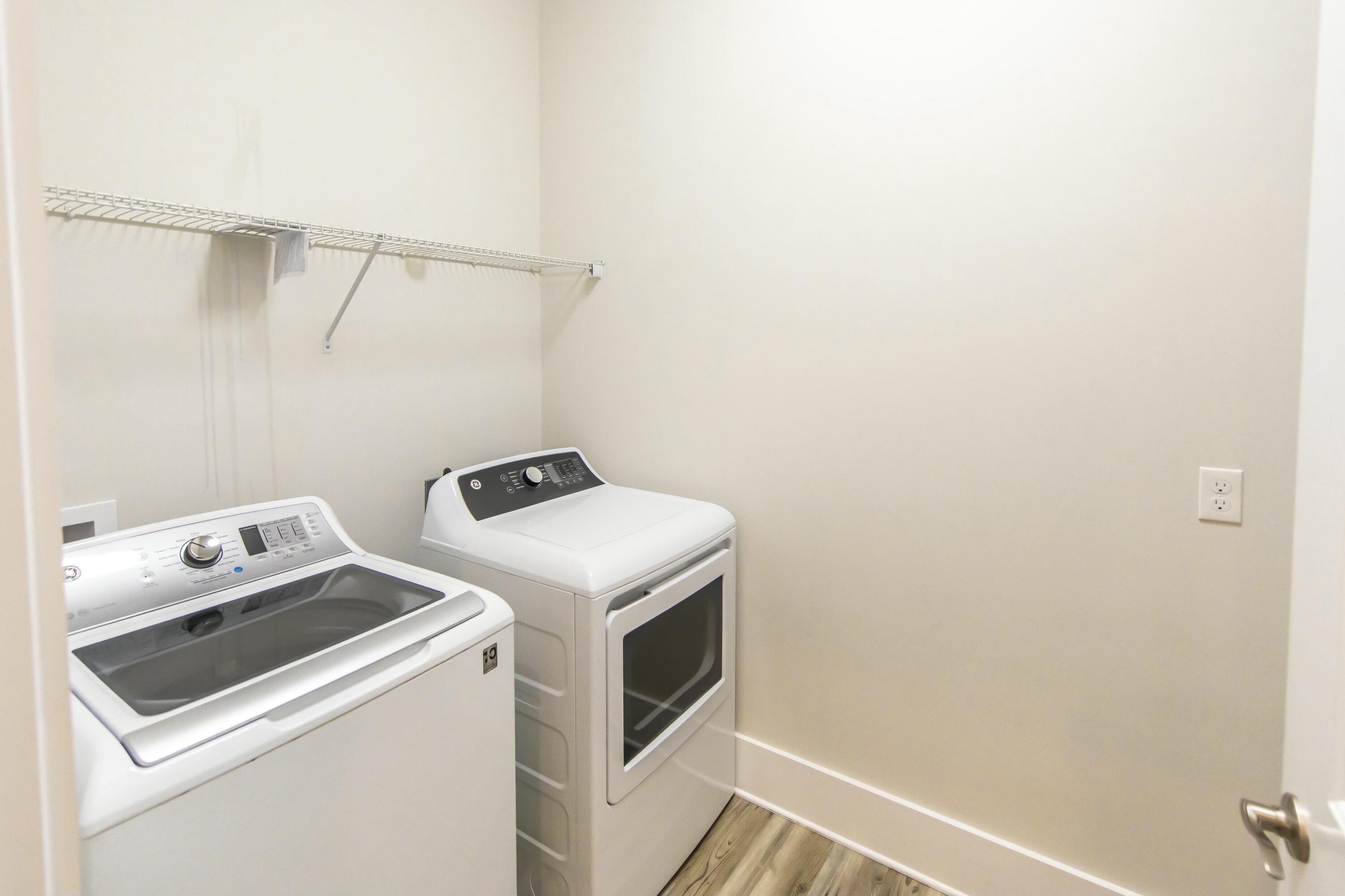 995 Airport Road, Unit 37 Destin, FL 32541 - Photo 14 of 46 a utility room with dryer and washer