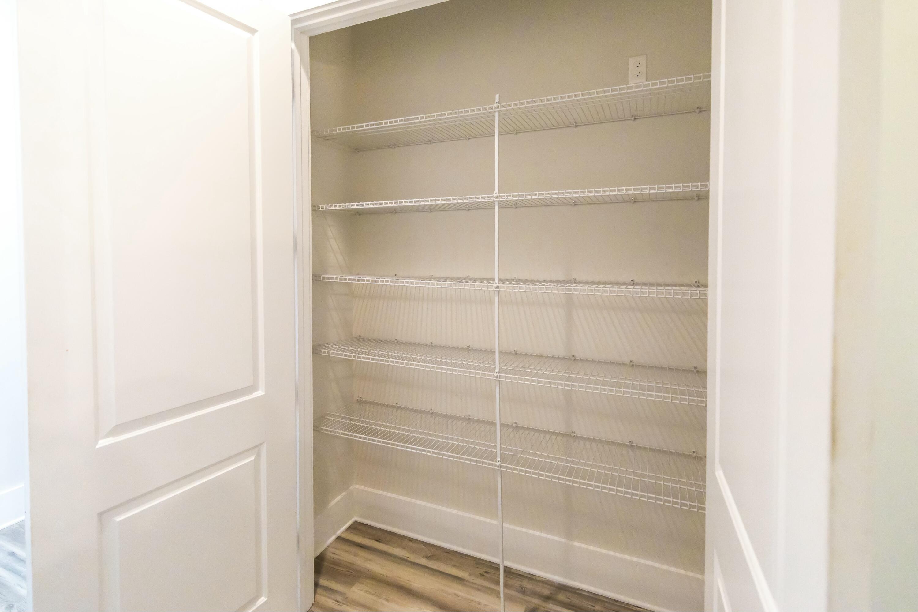 995 Airport Road, Unit 37 Destin, FL 32541 - Photo 15 of 46 a view of a walk in closet