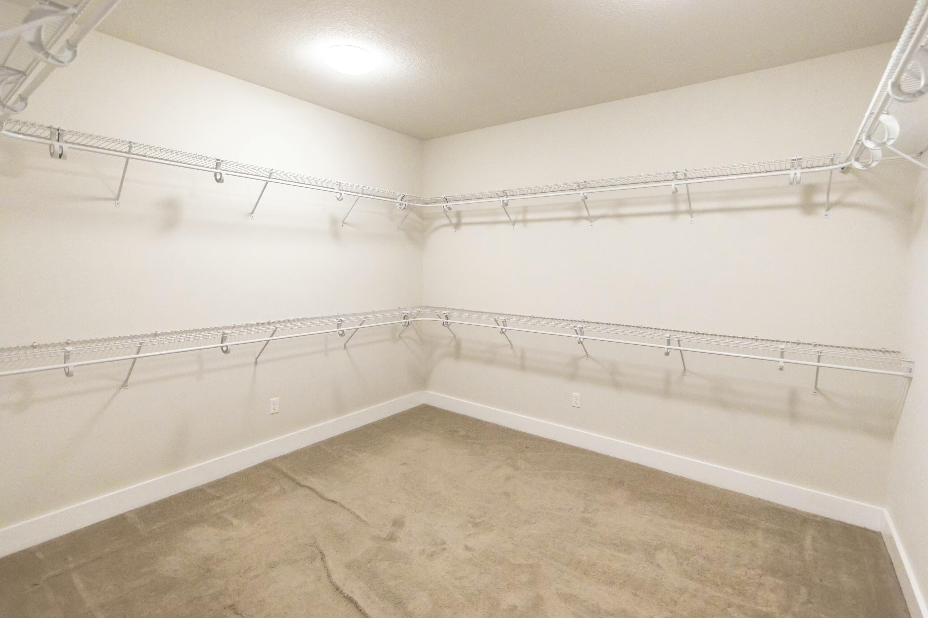 995 Airport Road, Unit 37 Destin, FL 32541 - Photo 23 of 46 a view of a room with racks on the wall