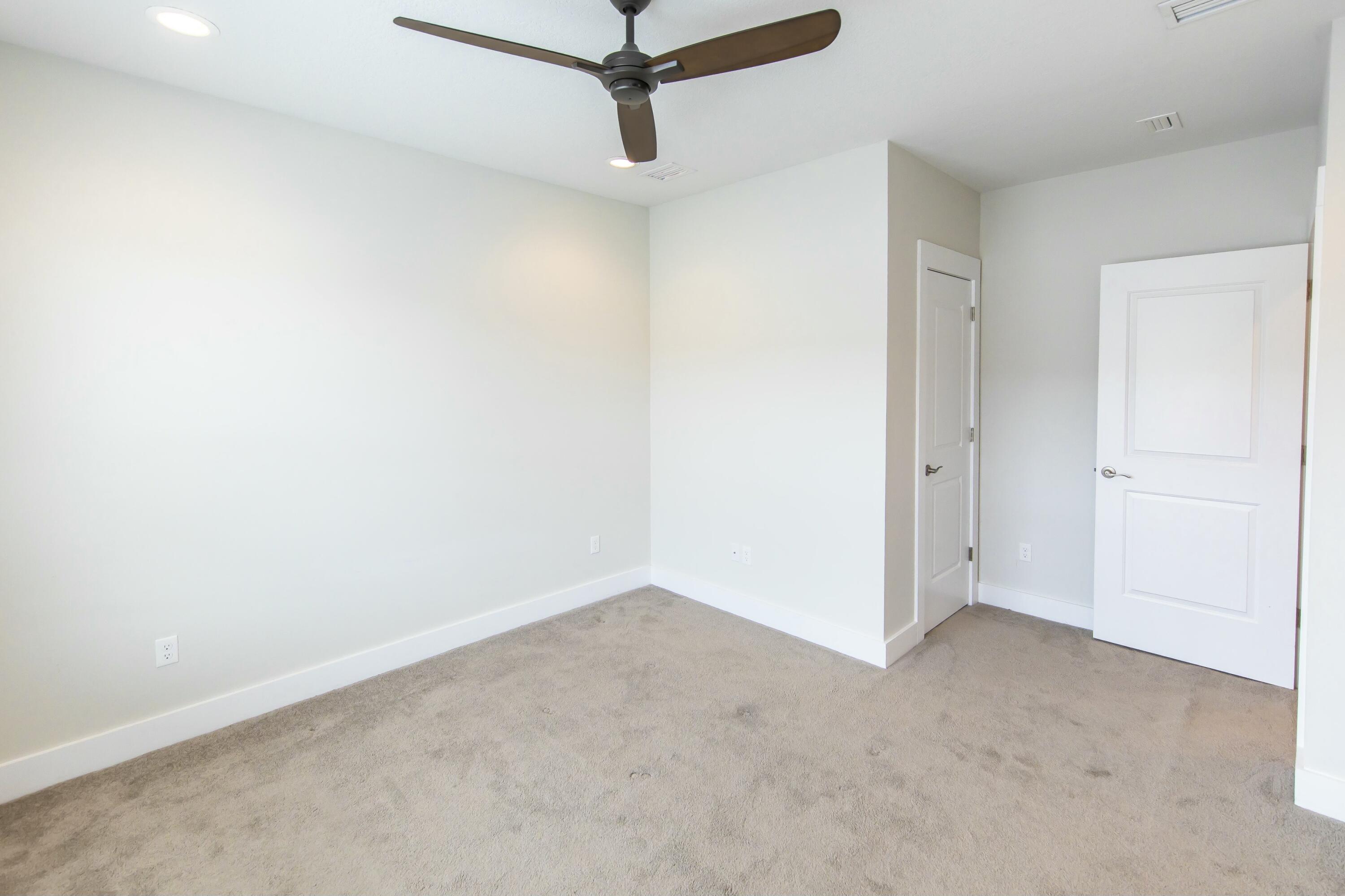 995 Airport Road, Unit 37 Destin, FL 32541 - Photo 29 of 46 a view of a room with a ceiling fan