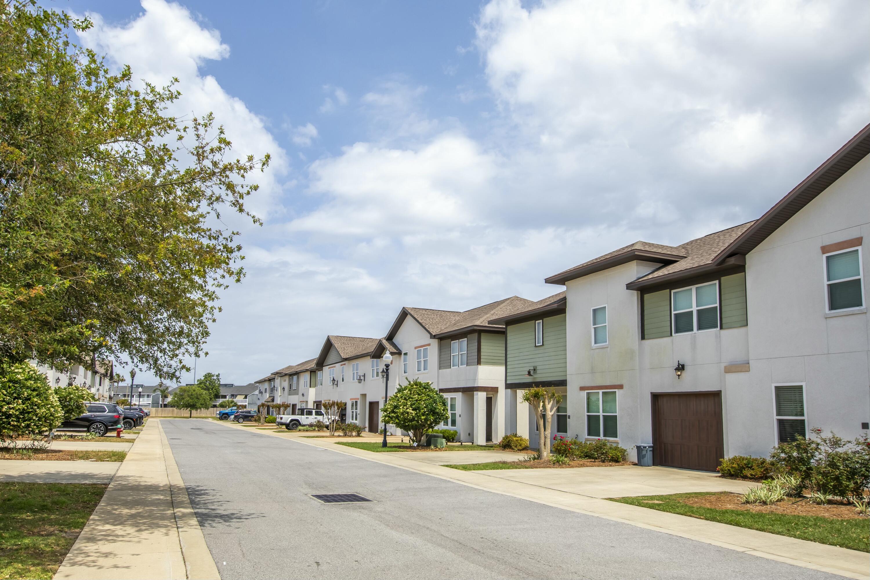 995 Airport Road, Unit 37 Destin, FL 32541 - Photo 45 of 46 a front view of a house with a garden