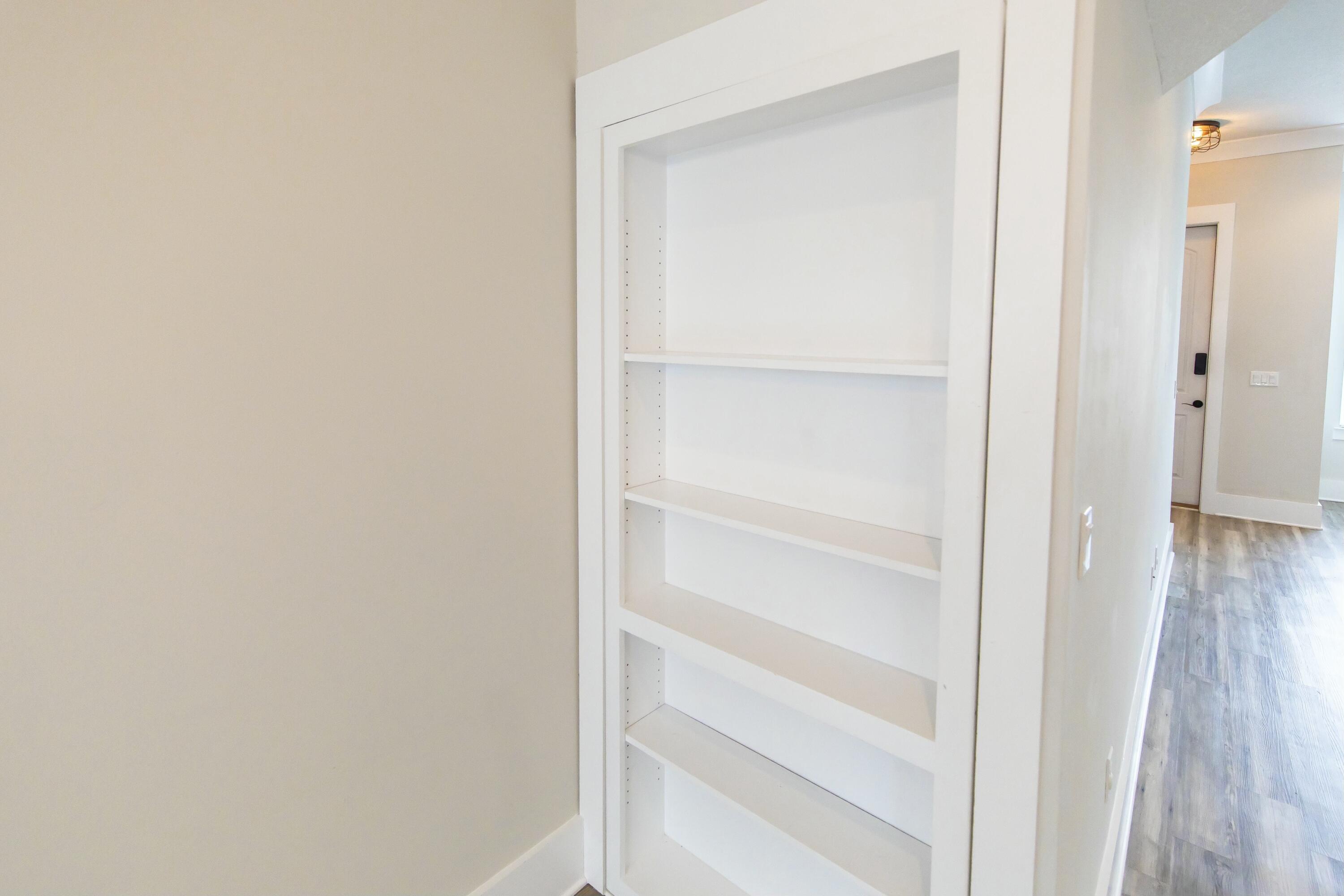 995 Airport Road, Unit 37 Destin, FL 32541 - Photo 10 of 46 a view of walk in closet with empty racks