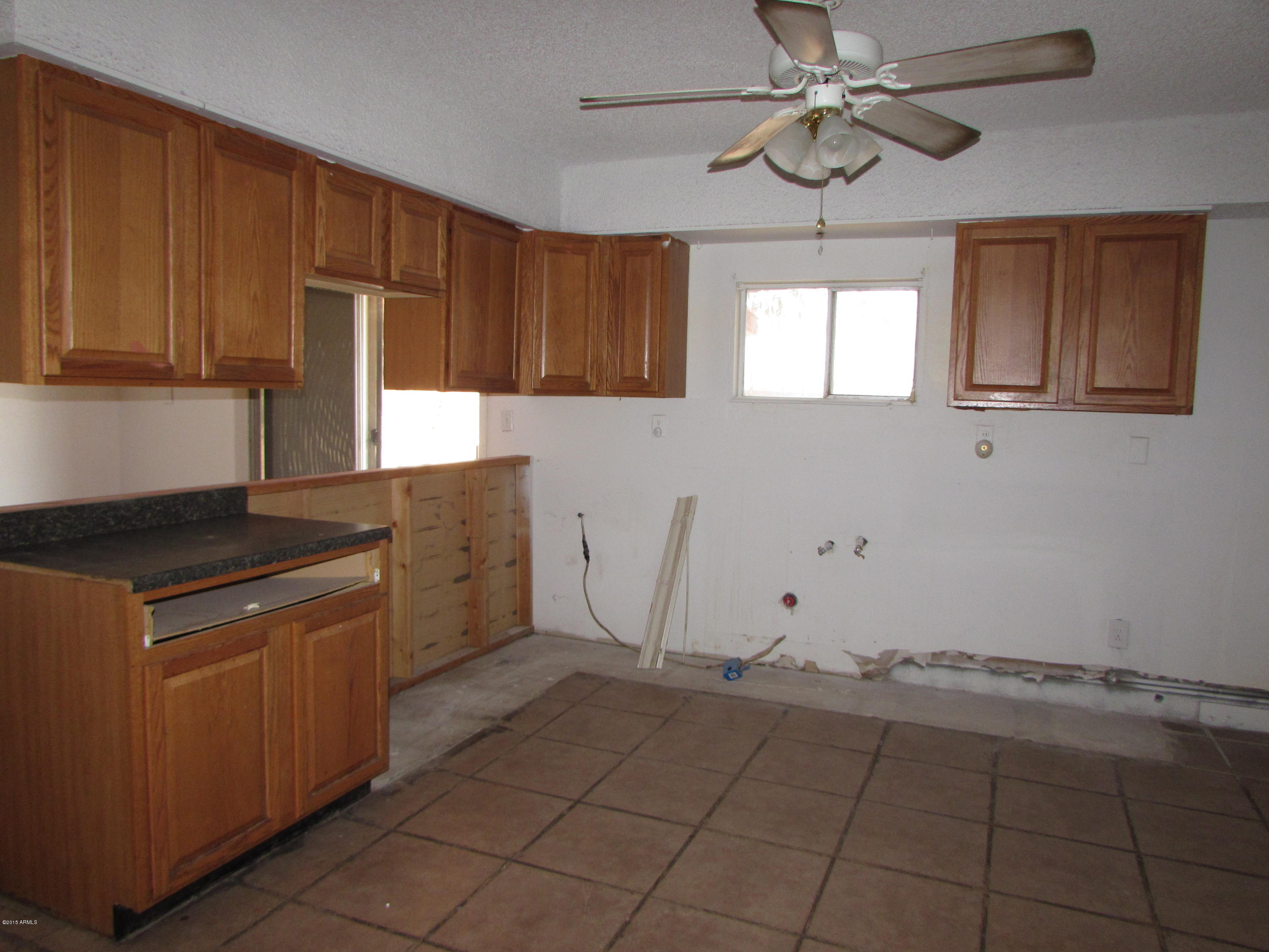202 North Apache Road Buckeye, AZ 85326 - Photo 3 of 10 MontApacheMLS 057