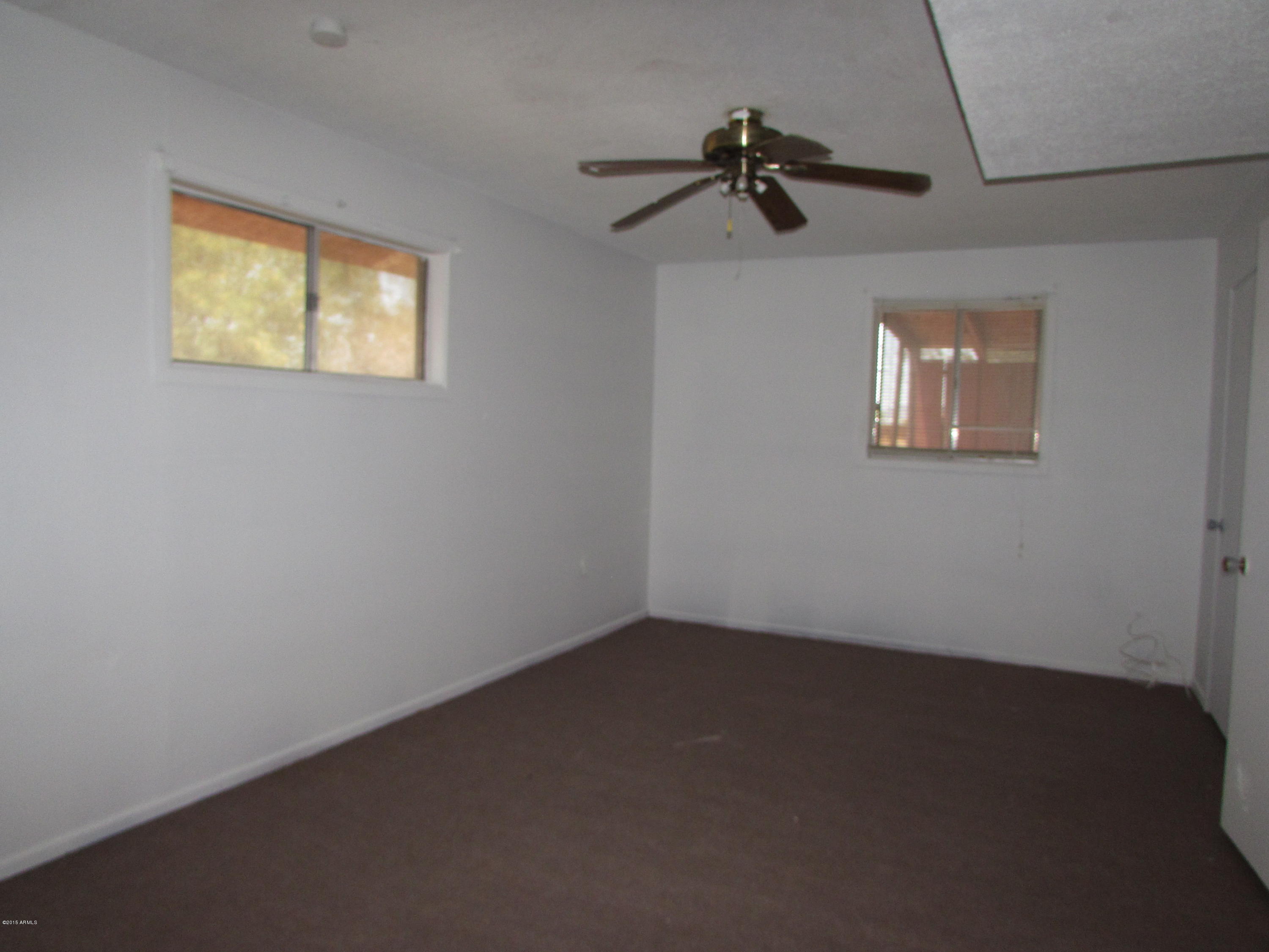 202 North Apache Road Buckeye, AZ 85326 - Photo 5 of 10 MontApacheMLS 058