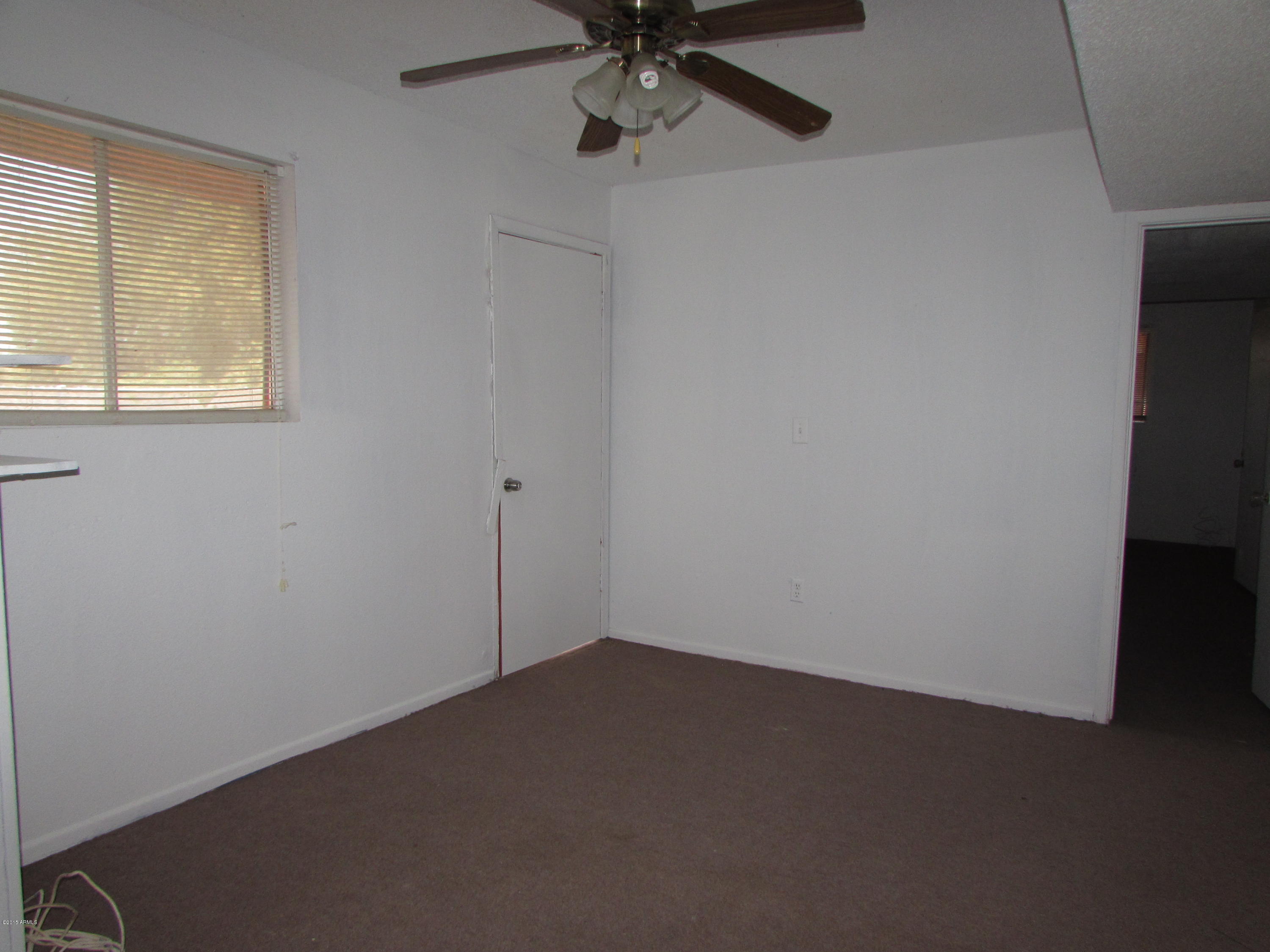 202 North Apache Road Buckeye, AZ 85326 - Photo 8 of 10 MontApacheMLS 061