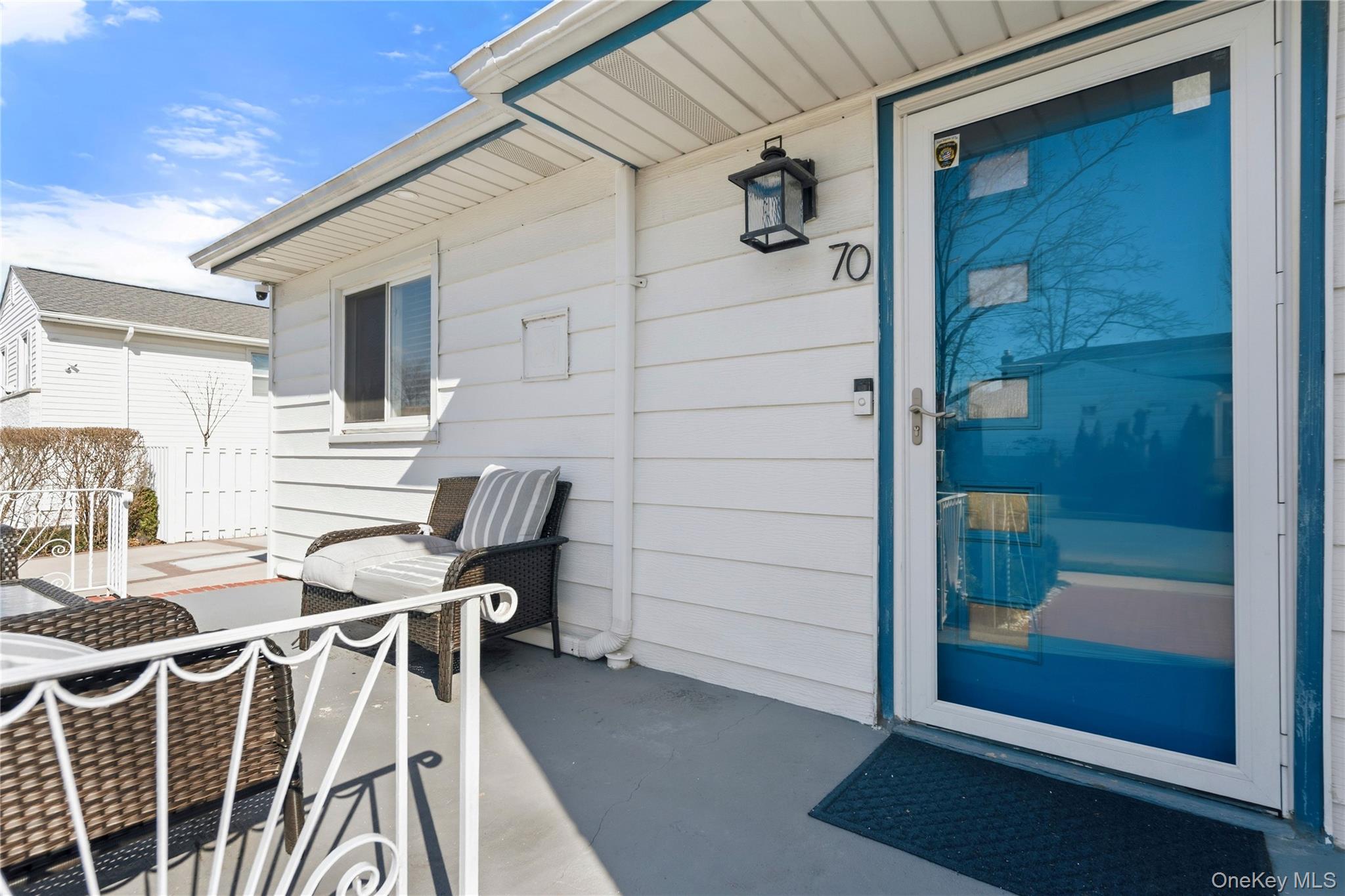 70 Forest Road Valley Stream, NY 11581 - Photo 3 of 43 a view of a patio with table and chairs