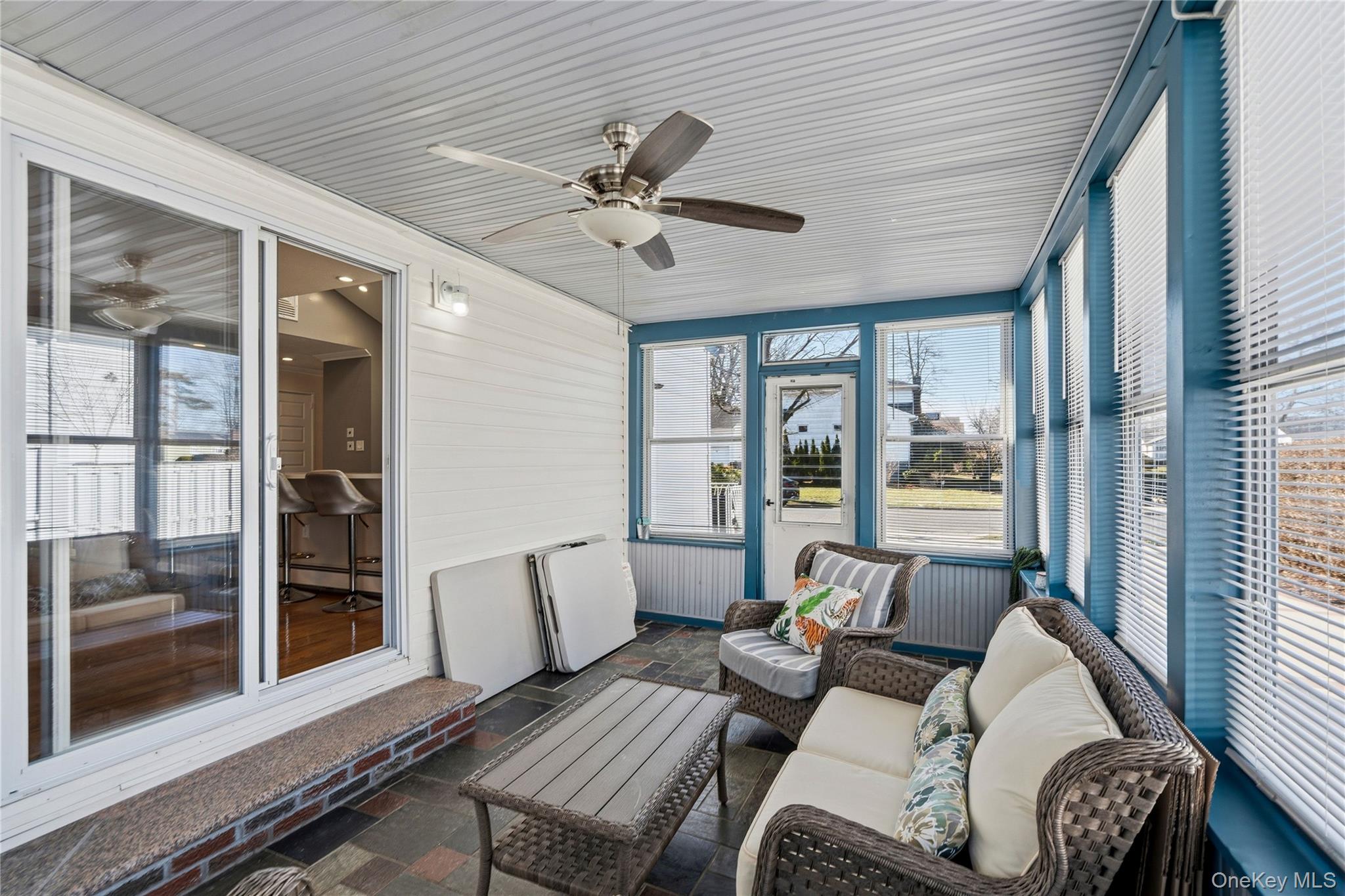 70 Forest Road Valley Stream, NY 11581 - Photo 32 of 43 a living room with furniture and a window