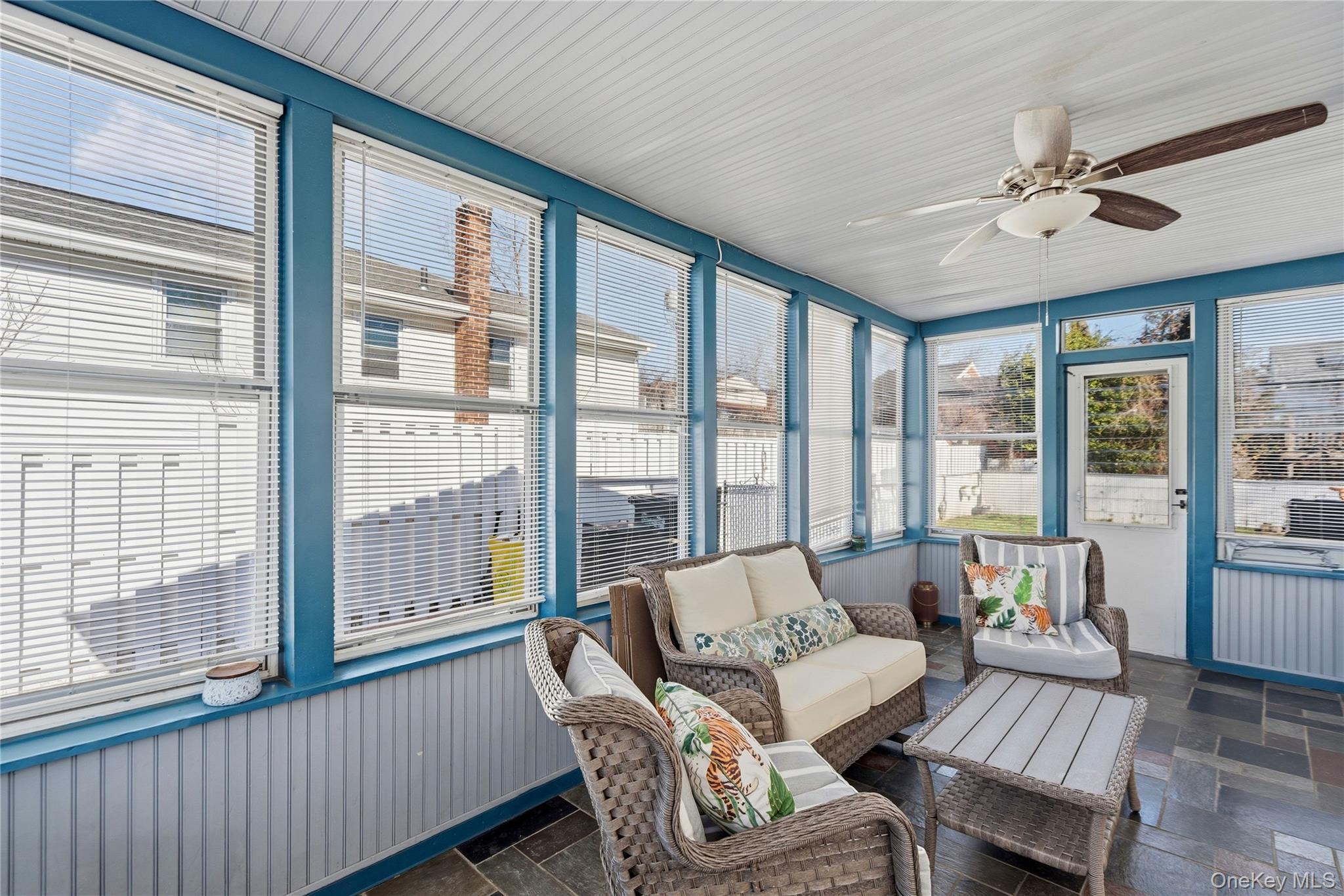 70 Forest Road Valley Stream, NY 11581 - Photo 33 of 43 a living room with furniture and large windows