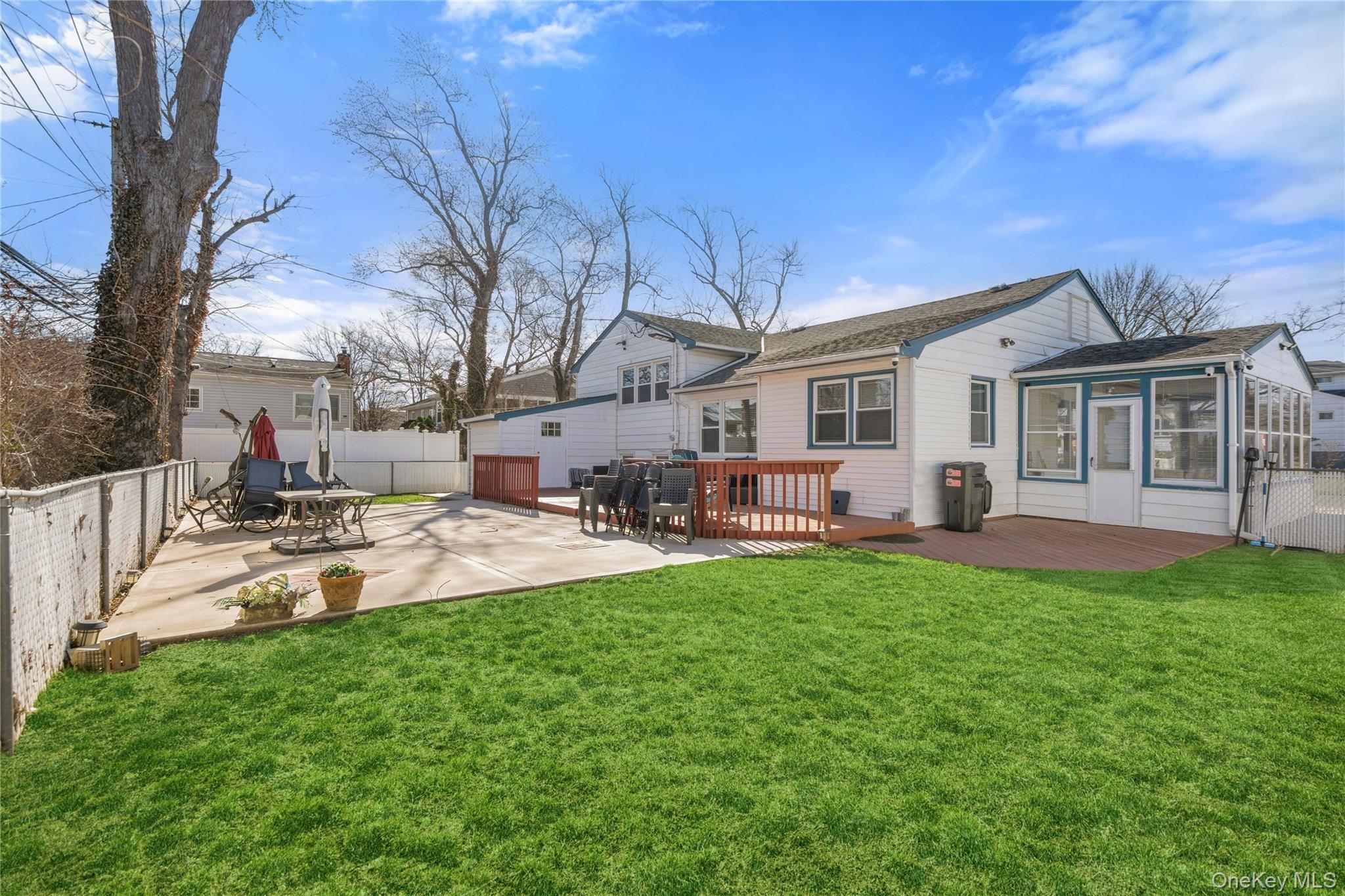 70 Forest Road Valley Stream, NY 11581 - Photo 38 of 43 a view of a house with backyard and sitting area