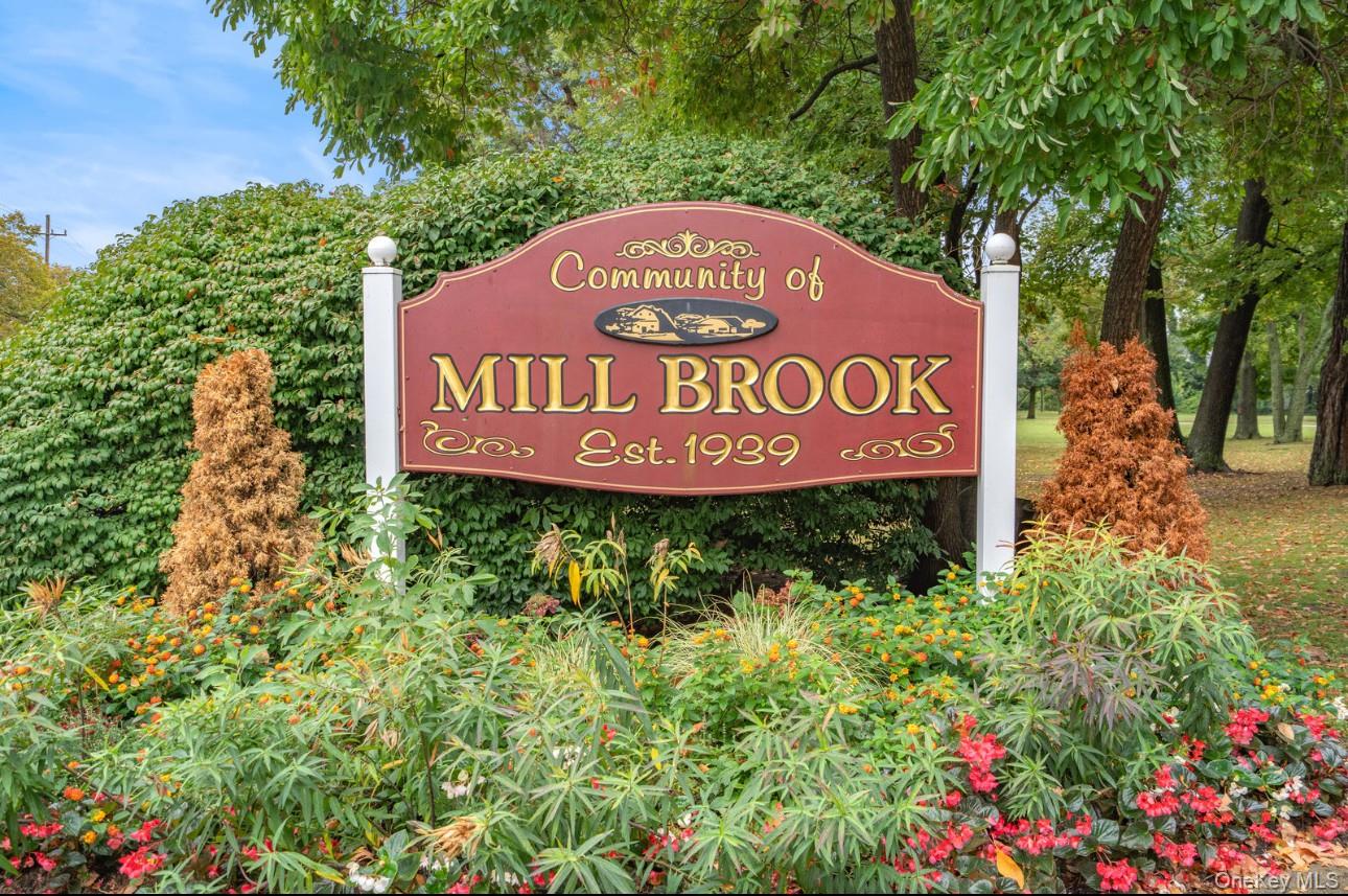 70 Forest Road Valley Stream, NY 11581 - Photo 43 of 43 a sign broad in front of flowers