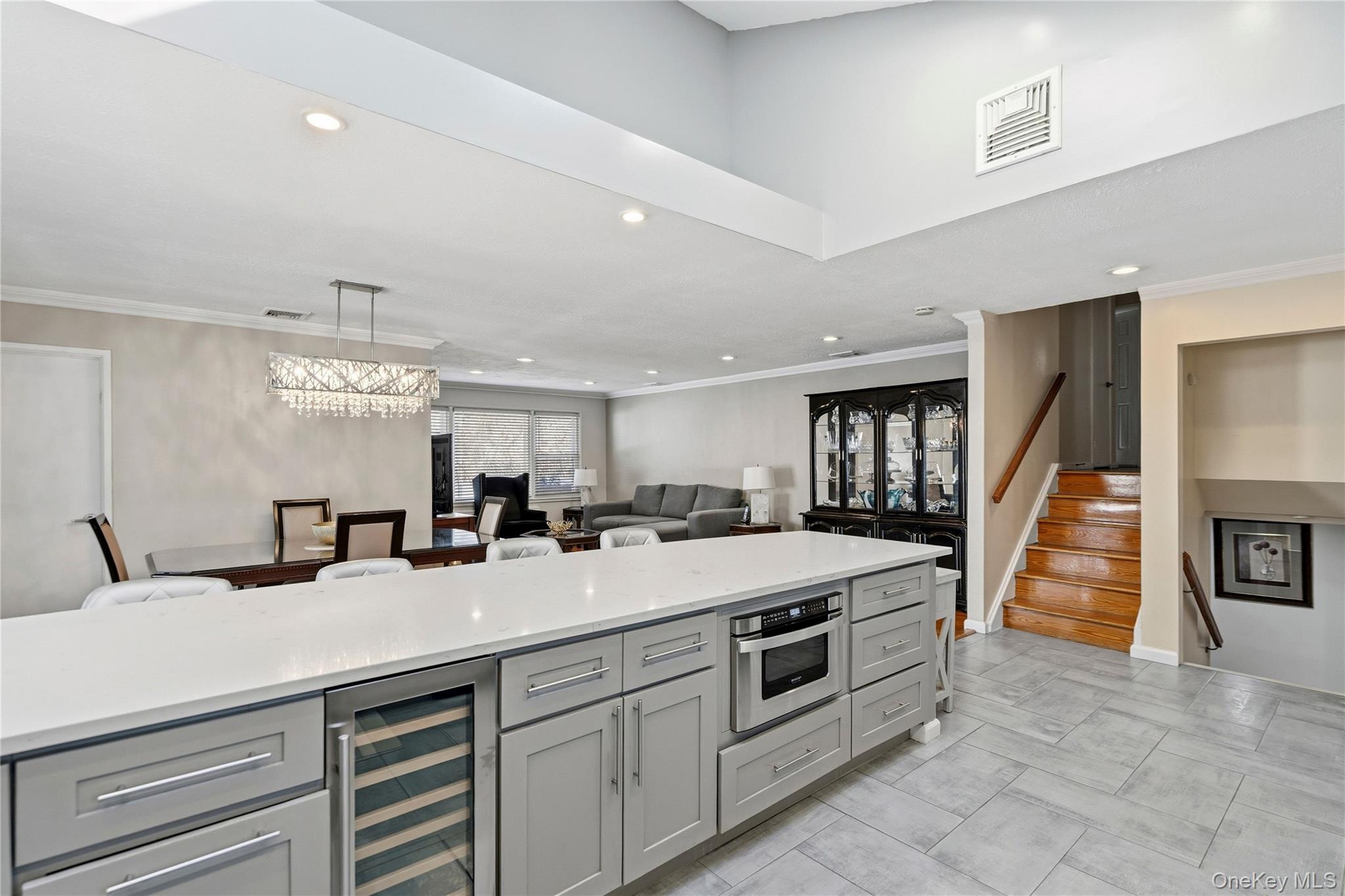 70 Forest Road Valley Stream, NY 11581 - Photo 9 of 43 a kitchen with sink and cabinets