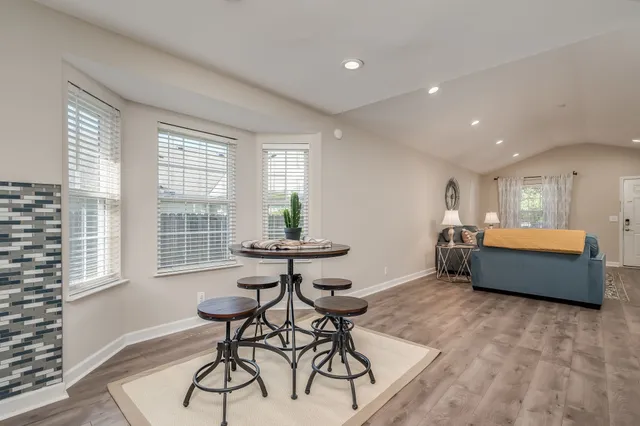 a room with furniture and windows