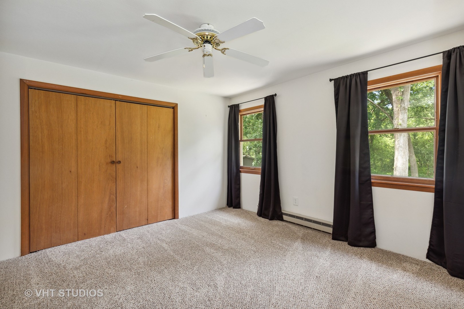 14933 Mill Road Capron, IL 61012 - Photo 13 of 15 a view of a room with a large window and a ceiling fan