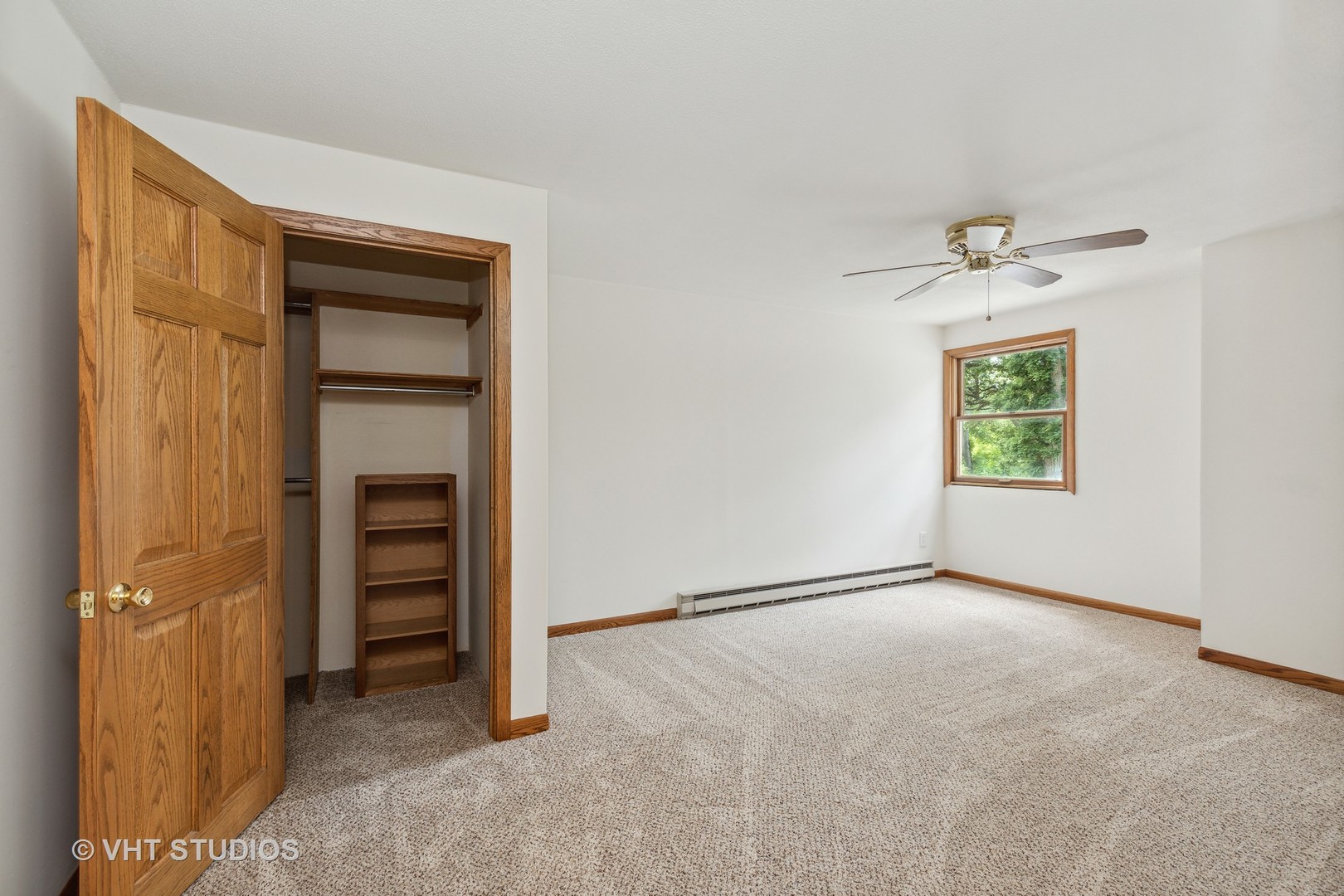 14933 Mill Road Capron, IL 61012 - Photo 14 of 15 an empty room with windows and closet