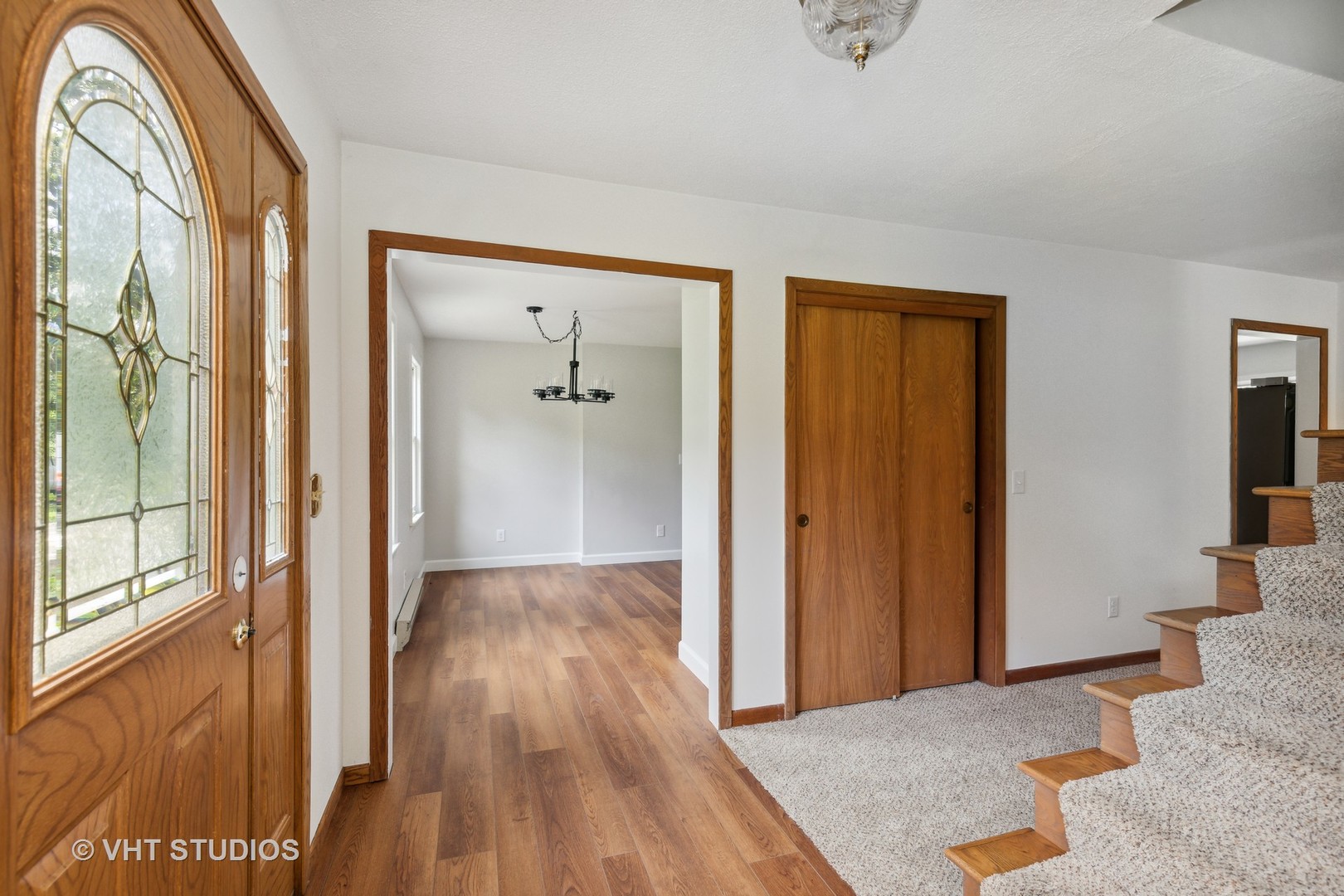 14933 Mill Road Capron, IL 61012 - Photo 2 of 15 a view of hallway with livingroom and wooden floor